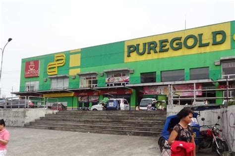 Puregold says to acquire 14 Divimarts to expand reach.